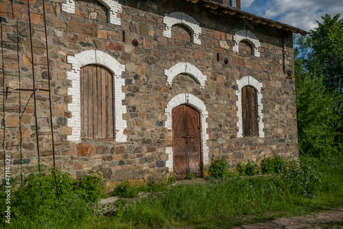 Wallpaper Mural 
Abandoned building of an old mill in summer Torontodigital.ca