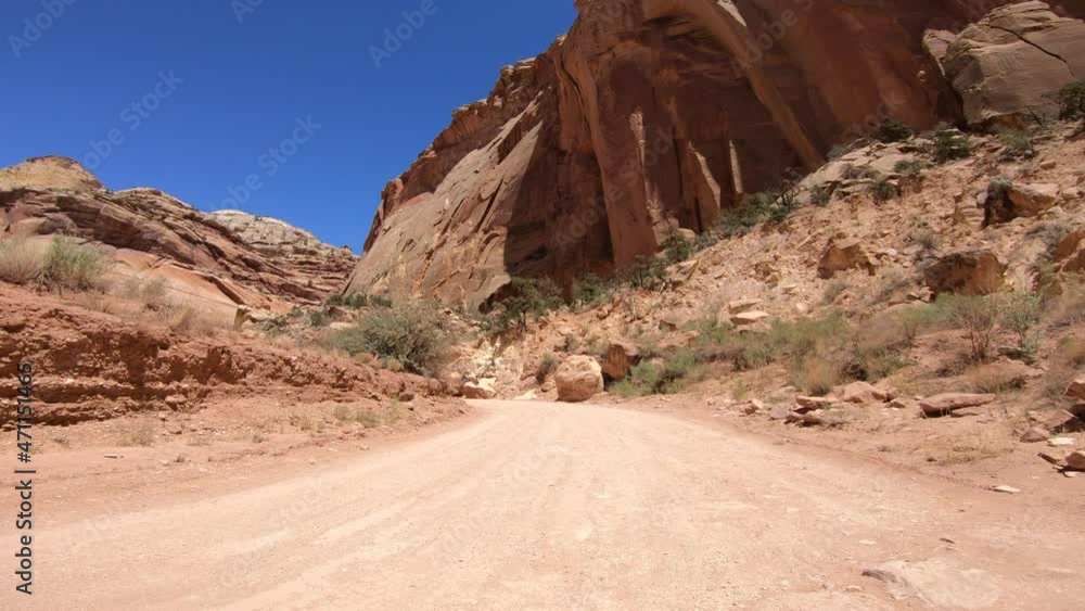 ZION, USA - JULY 2019: Crossing the Canyon in summer season, view from the front of the car ZION, USA - JULY 2019: Crossing the Canyon in summer season, view from the front of the car