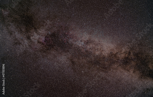 Night summer sky with milky way near swan constellation  North America nebula nebula faintly visible. Long exposure stacked photo