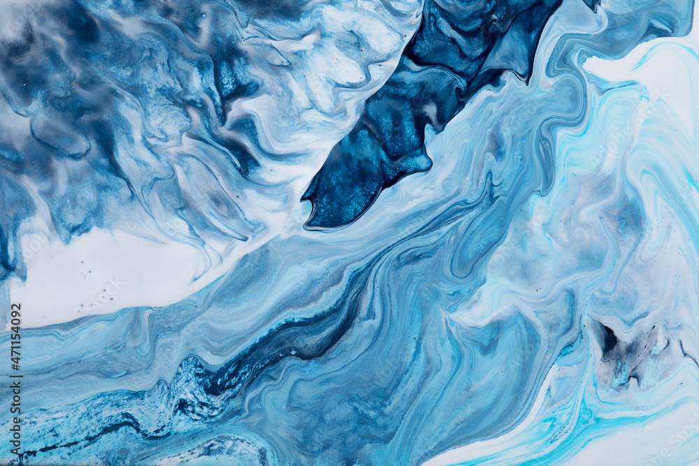 Abstract acrylic pouring art in colors of ocean. Waves and swirls. Texture with marble effect Abstract acrylic pouring art in colors of ocean. Waves and swirls. Texture with marble effect
