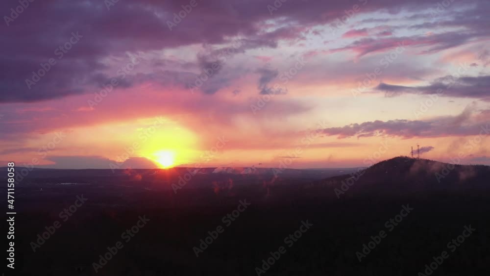 Aerial view of the natural landscape sunset of the bright sun over the mountains Aerial view of the natural landscape sunset of the bright sun over the mountains