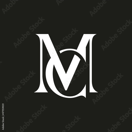 M and C logo on black background photo