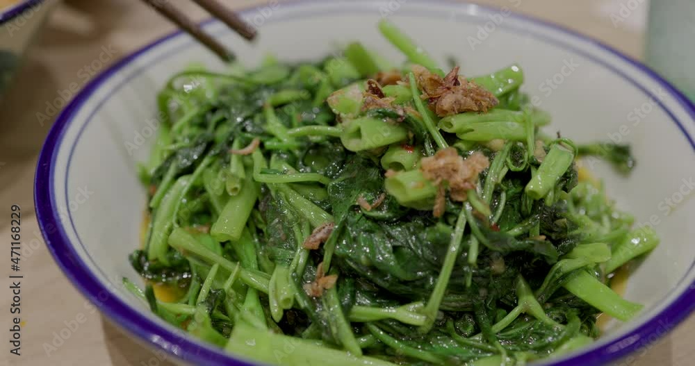 Fry morning glory with garlic dishes in restaurant Fry morning glory with garlic dishes in restaurant