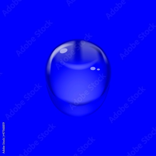 Rain drop. Drop of water on a blue background.