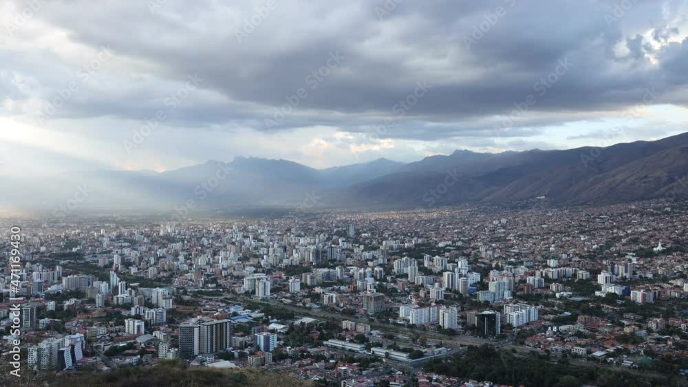Cinematic cityscape timelapse video of Cochabamba Bolivia South America on a cloudy afternoon during golden hour shortly before sunset Cinematic cityscape timelapse video of Cochabamba Bolivia South America on a cloudy afternoon during golden hour shortly before sunset