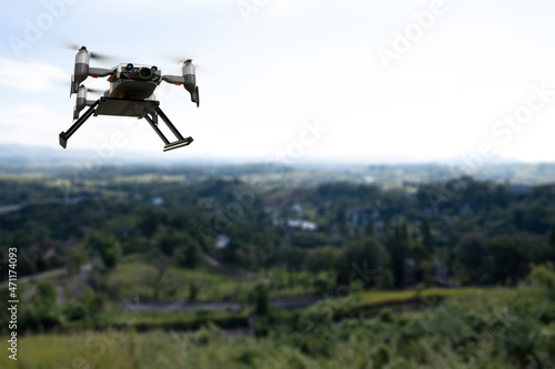 Fototapeta Naklejka Na Ścianę i Meble -  Drone technology engineering device industry flying in industrial logistic export import product home delivery service logistics shipping transport transportation to go new year 2022