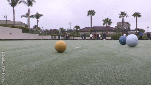 People playing bowling for fun
