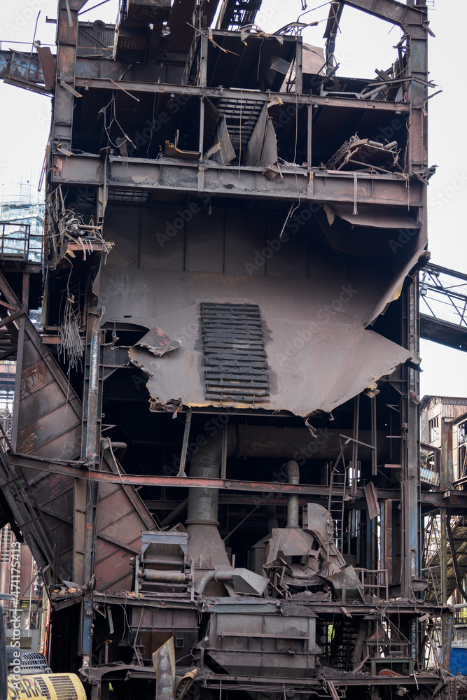 Part of a building during demolition - metallurgical industry.