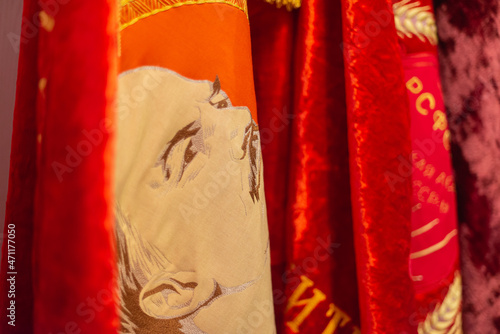 Red flag with Lenin. Close-up.