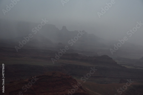 Foggy view of canyon in the early ev ending nature
