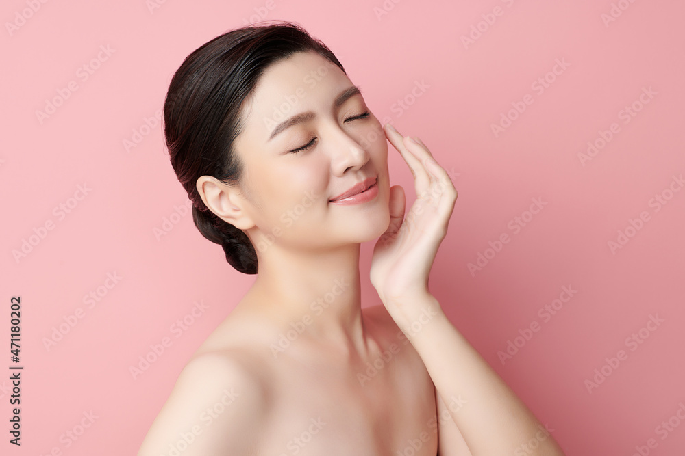 Beautiful young asian woman with clean fresh skin on pink background, Face care, Facial treatment, Cosmetology, beauty and spa, Asian women portrait. Beautiful young asian woman with clean fresh skin on pink background, Face care, Facial treatment, Cosmetology, beauty and spa, Asian women portrait.
