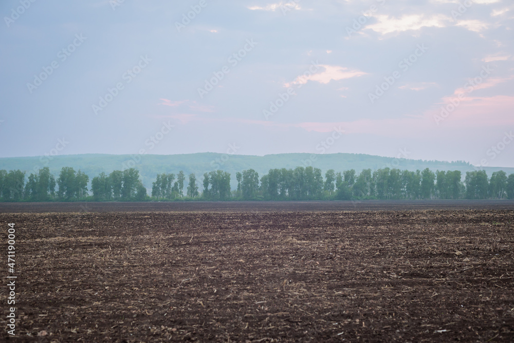 Spring field of farmers. It's time to work on the field. Spring field of farmers. It's time to work on the field.