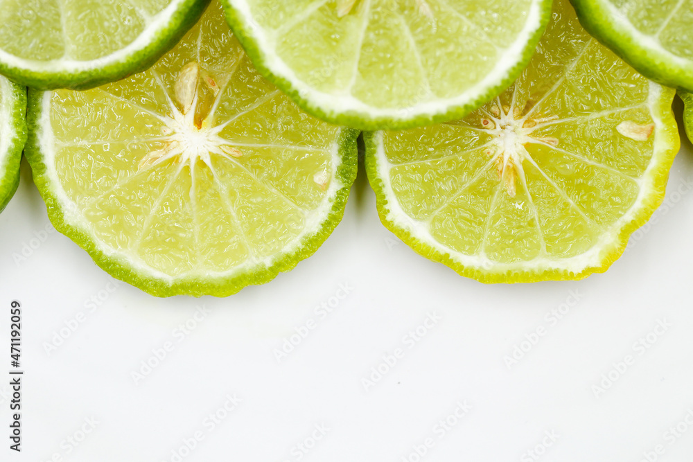 Top view of sliced bergamot on white dish with copy space Top view of sliced bergamot on white dish with copy space