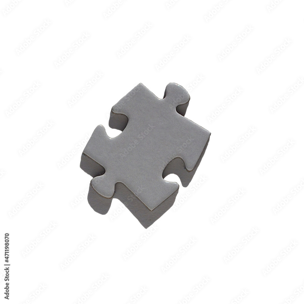 One three-dimensional piece of a gray-white puzzle with shadows, isolated on a white background One three-dimensional piece of a gray-white puzzle with shadows, isolated on a white background
