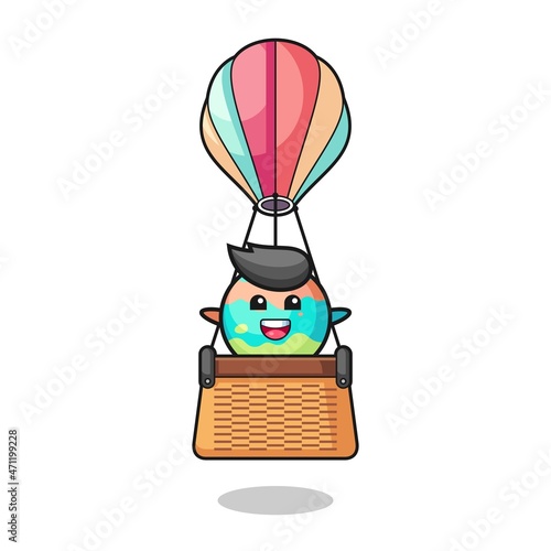 bath bombs mascot riding a hot air balloon