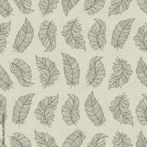 Seamless pattern with decorative feathers. Openwork leaves on a checkered linen background with burlap texture. Soft gray  brown  beige colors. Texture for fabrics  wallpaper  textiles  wrapping paper