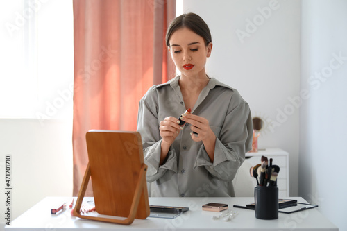 Beautiful woman with red li...