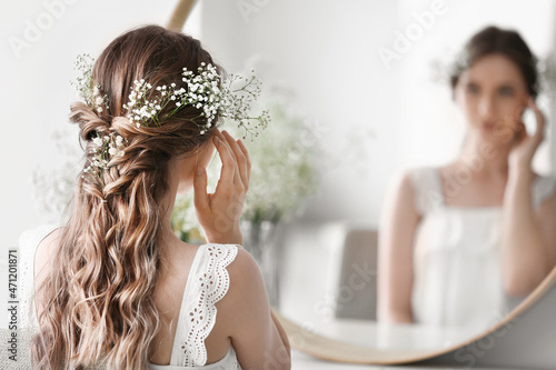 Fotografia Beautiful young bride preparing for her wedding day