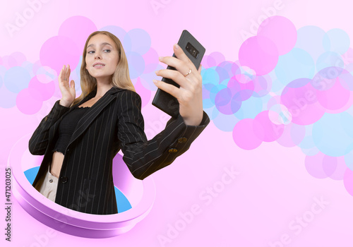 Girl takes selfie. Woman wi...