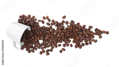Overturned cup with roasted coffee beans on white background, top view