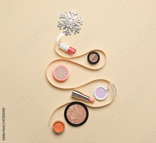 Beautiful composition with makeup cosmetics on color background