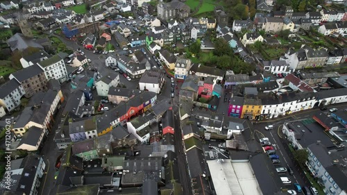 Downtown Kinsale, Ireland, Drone Aerial View, Colorful Buildings, Cars, Streets. Idyllic Irish Town on Cloudy Autumn Day photo