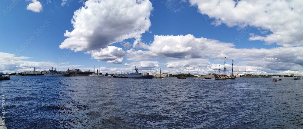 Panoramic view of the warships, frigates and sailboats built in the Neva water area for the Day of the Navy in St. Petersburg