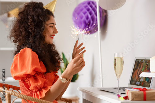 Young woman celebrating Bir...