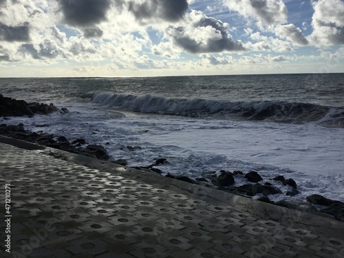 Waves on the Black Sea. Sochi. Pebble beach. Breakwater