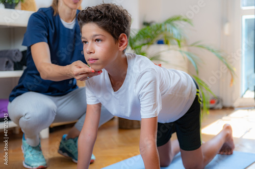 Child training with physical therapist.