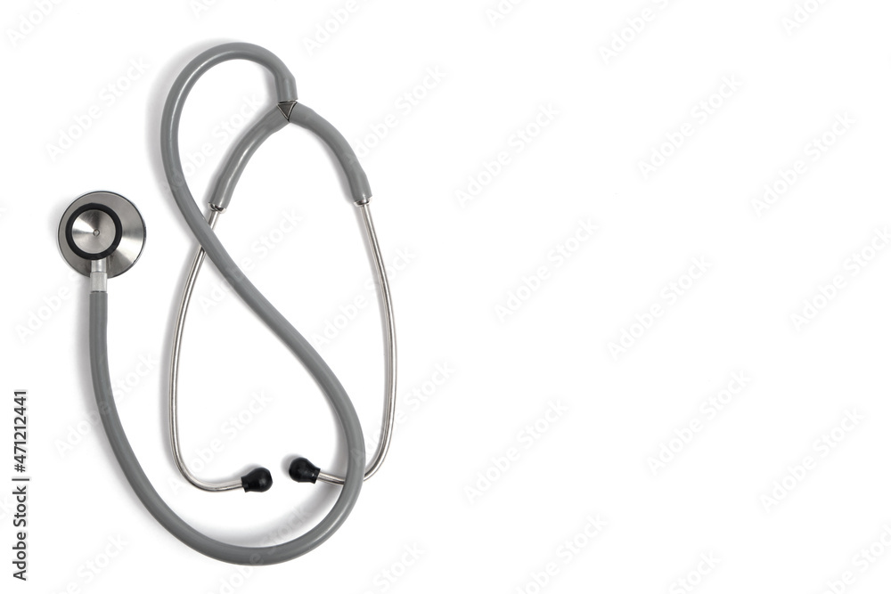 Stethoscope on a white background, a medical instrument. Stethoscope on a white background, a medical instrument.