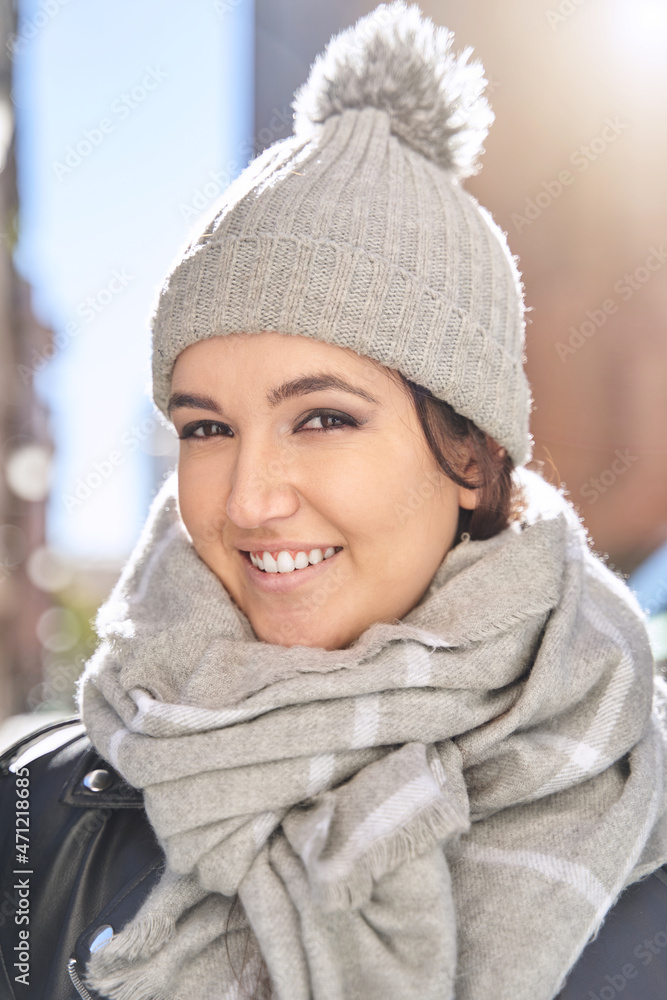 Merry young female in knitted hat Merry young female in knitted hat