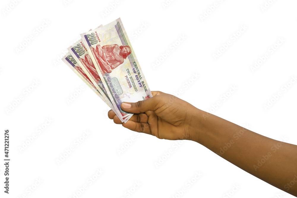 Fair hand holding 3D rendered 200 Egyptian pound notes isolated on white background - obrazy, fototapety, plakaty 