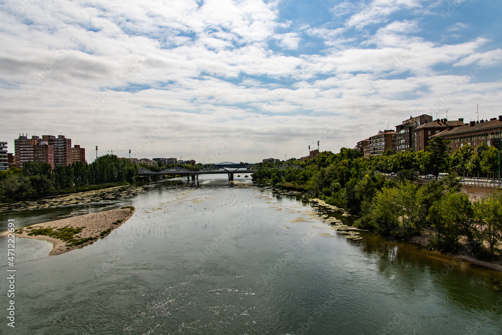 modern landscape of Zaragoza spain in summer day with river and bridge