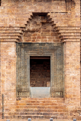 Fototapeta Naklejka Na Ścianę i Meble -  Entrance gate of the Jagamohana the assembly hall (or porch) of the Konark Sun Temple, Orissa, India. The entrance is fashioned from green chlorite