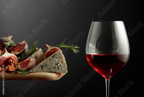Red wine with blue cheese, figs, walnuts, and rosemary.
