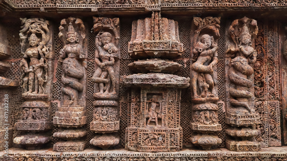 Temple platform of Jagamohana carved with  erotic couples, young women flaunting their beauty in poses, nagas, vyalas, soldiers, elephants, court scenes Sun Temple Konark, Odisha, India.