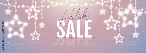 Christmas holiday sale banner with modern glowing star lamps on silver background