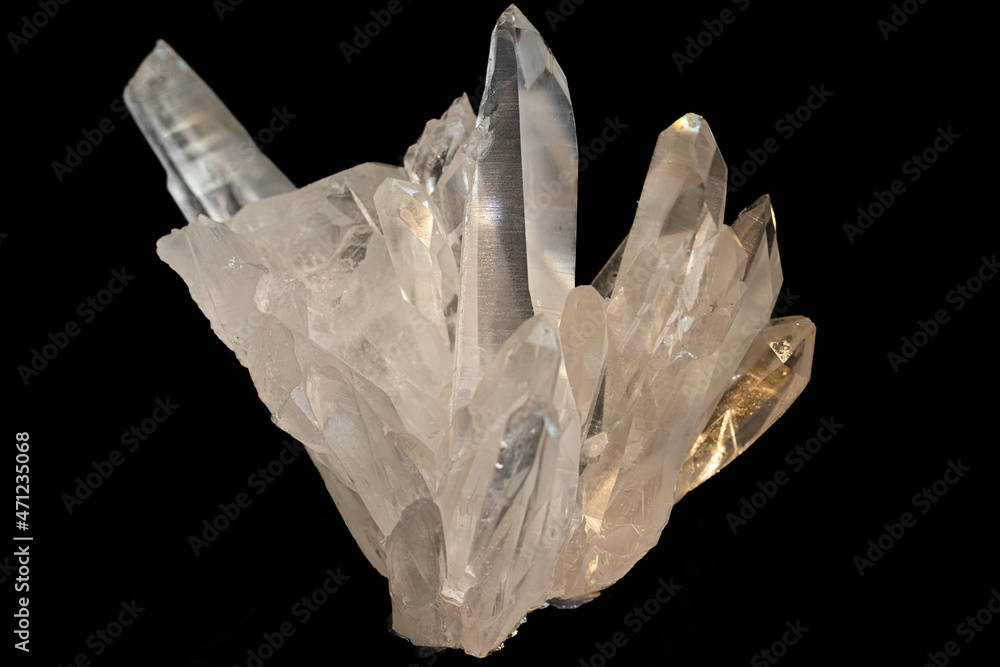beautiful Quartz Crystal cluster gemstone isolated on black background