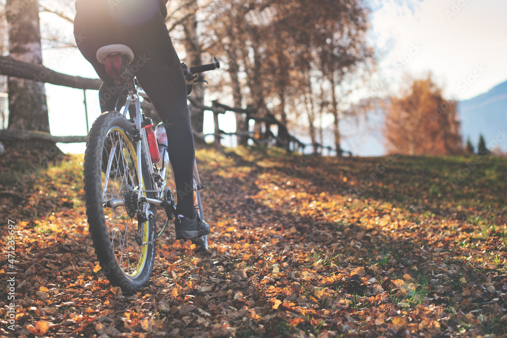 Passage of a mountain bike on leafy paths in the hills Passage of a mountain bike on leafy paths in the hills