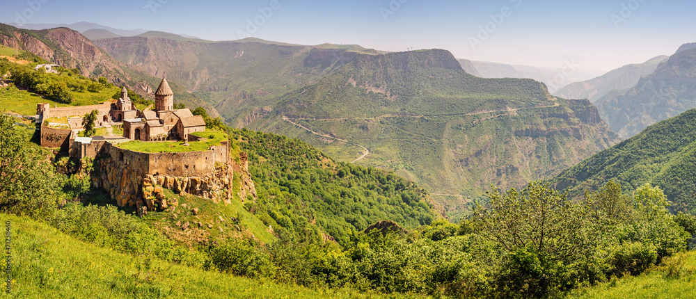 Majestic Tatev Monastery located on an inaccessible basalt rock with wonderful views of the Vorotan River gorge. Travel and worship attractions in Armenia