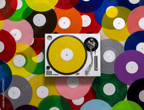 DJ turntables with different coloured records 