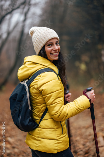 Portrait of excited, caucasian woman, admiring the nature around her.