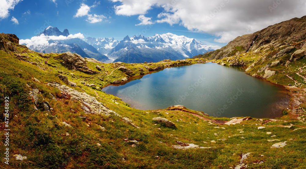 Panoramic scene of Lac Blanc on the background of Mont Blanc glacier. Graian Alps, France, Europe.