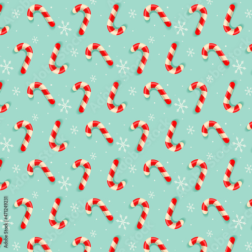 Seamless light blue pattern with Christmas candies and snow. Vector illustration. Background for wrapping paper, fabric print, greeting card design