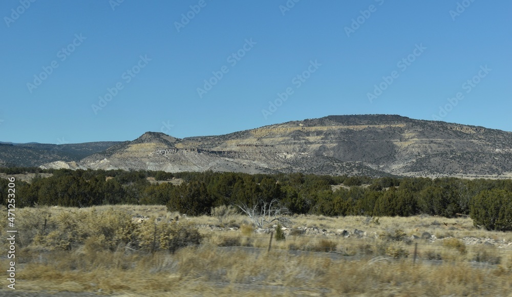 McCartys, New Mexico, USA - November 21, 2021: Desert Mountain Along the Highway on a Bright, Clear Late Fall Day McCartys, New Mexico, USA - November 21, 2021: Desert Mountain Along the Highway on a Bright, Clear Late Fall Day