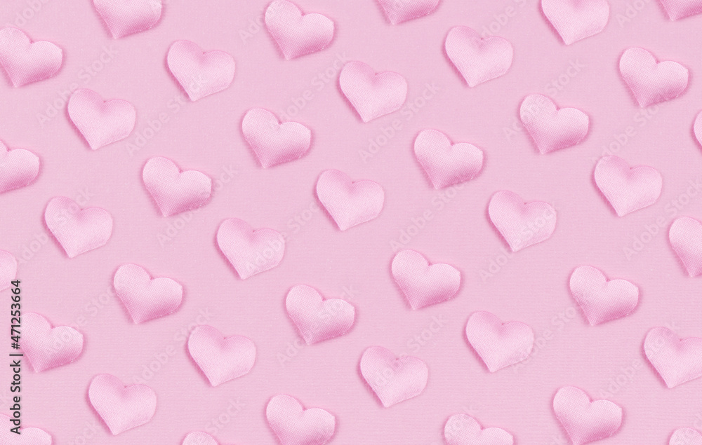 Pink satin hearts in a pattern for Valentine Day Pink satin hearts in a pattern for Valentine Day
