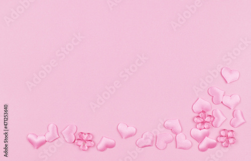 Pink satin hearts in a corn...