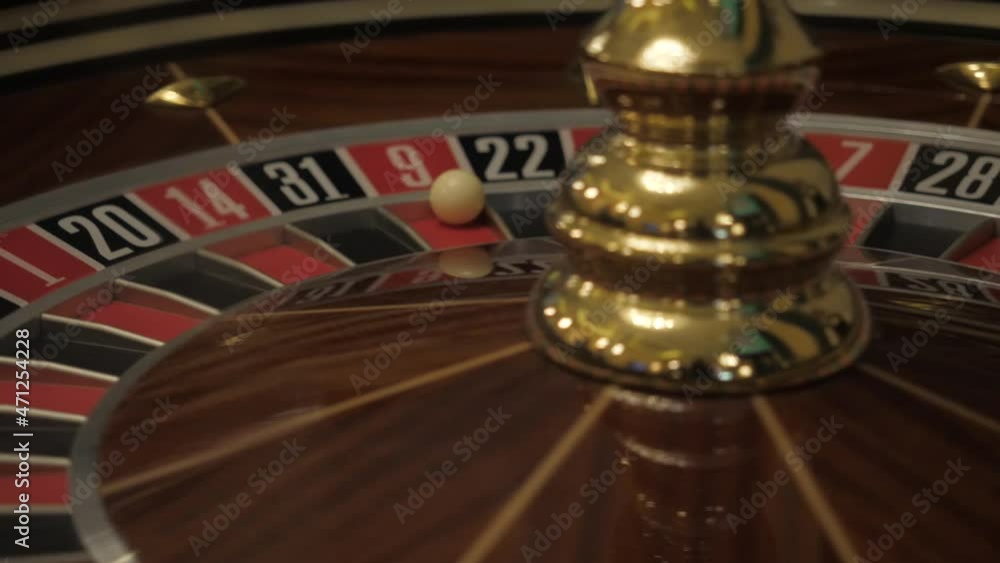 The rotating roulette wheel in the casino The rotating roulette wheel in the casino