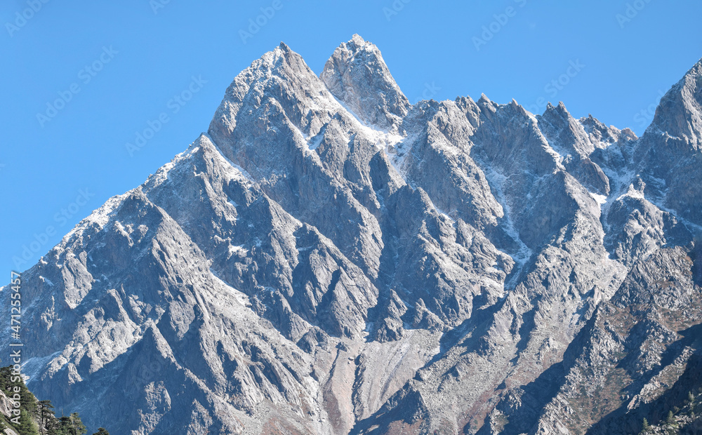 view of mountains against sky in Uttarakhand view of mountains against sky in Uttarakhand